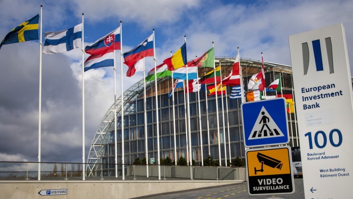 National flags fly outside the European Investment Bank East buidling in Luxembourg