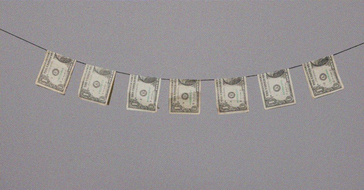 dollar bills on clothesline